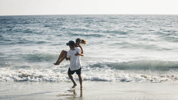 Couple on beach - what is masculinity