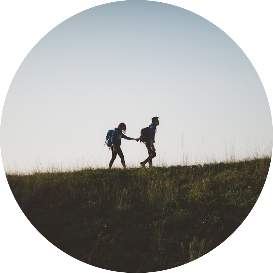 Couple walking on hill - Virtually Irresistable - circle